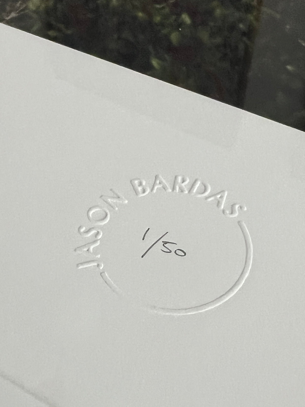 Embossed Jason Bardas artist stamp with handwritten edition number on a limited edition print